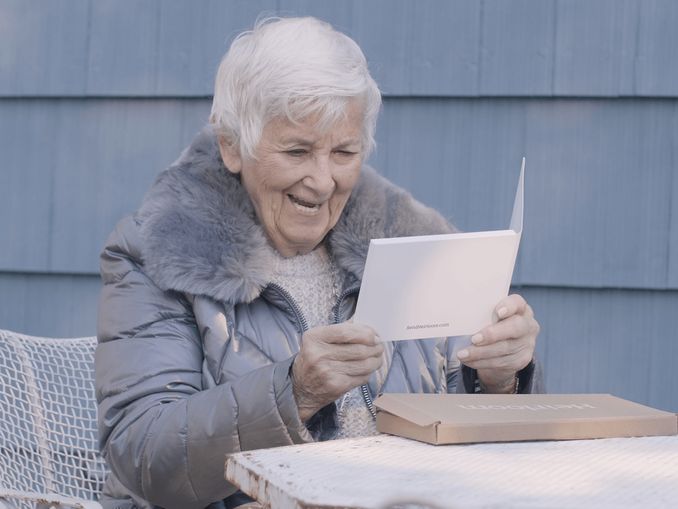 Woman watching Heirloom video book