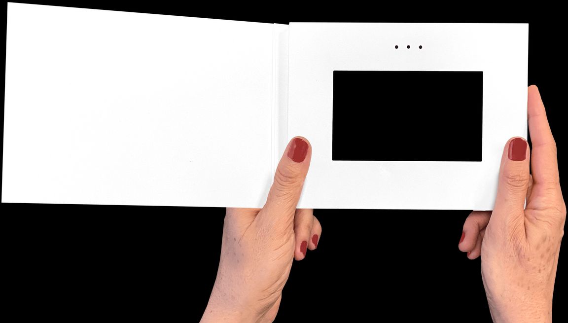 Woman holding Heirloom video book